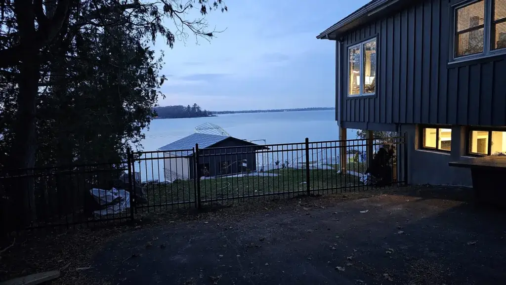 Decorative metal fence at lake